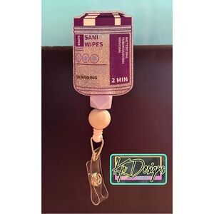 Purple Top (sanitizer) wipes badge reel